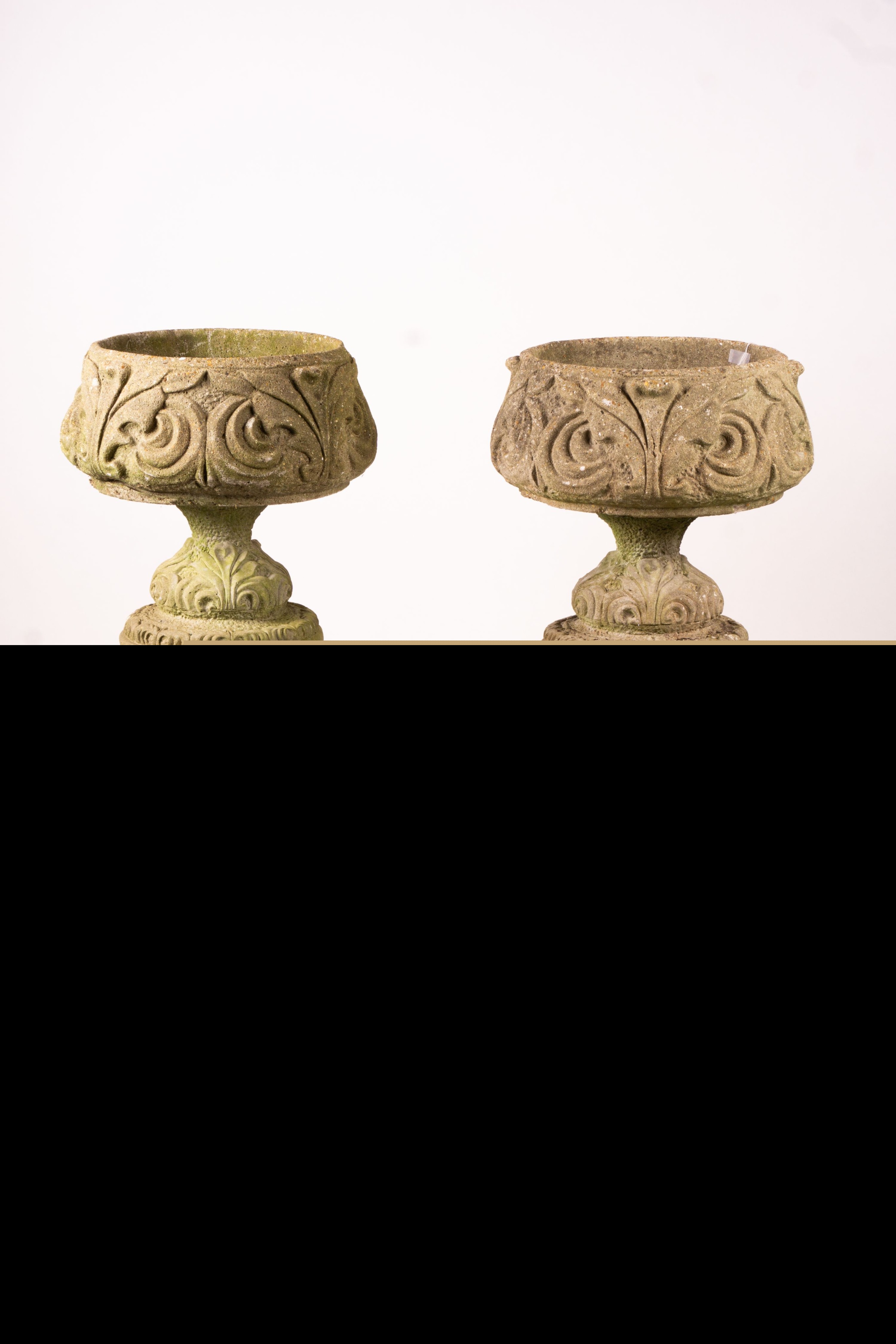 A pair of reconstituted stone circular garden planters on pedestal bases, diameter 45cm, height 110cm